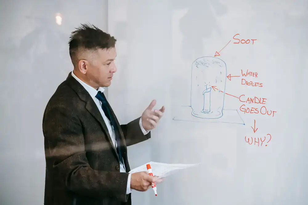 Instructor demonstrating pronunciation techniques